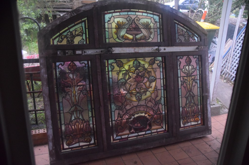 Period window with joinery needing restoration