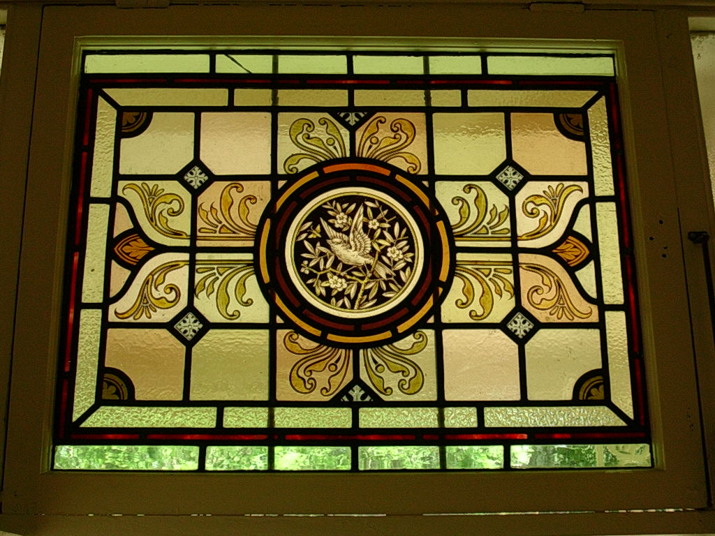 Painted panel featuring a painted bird decal